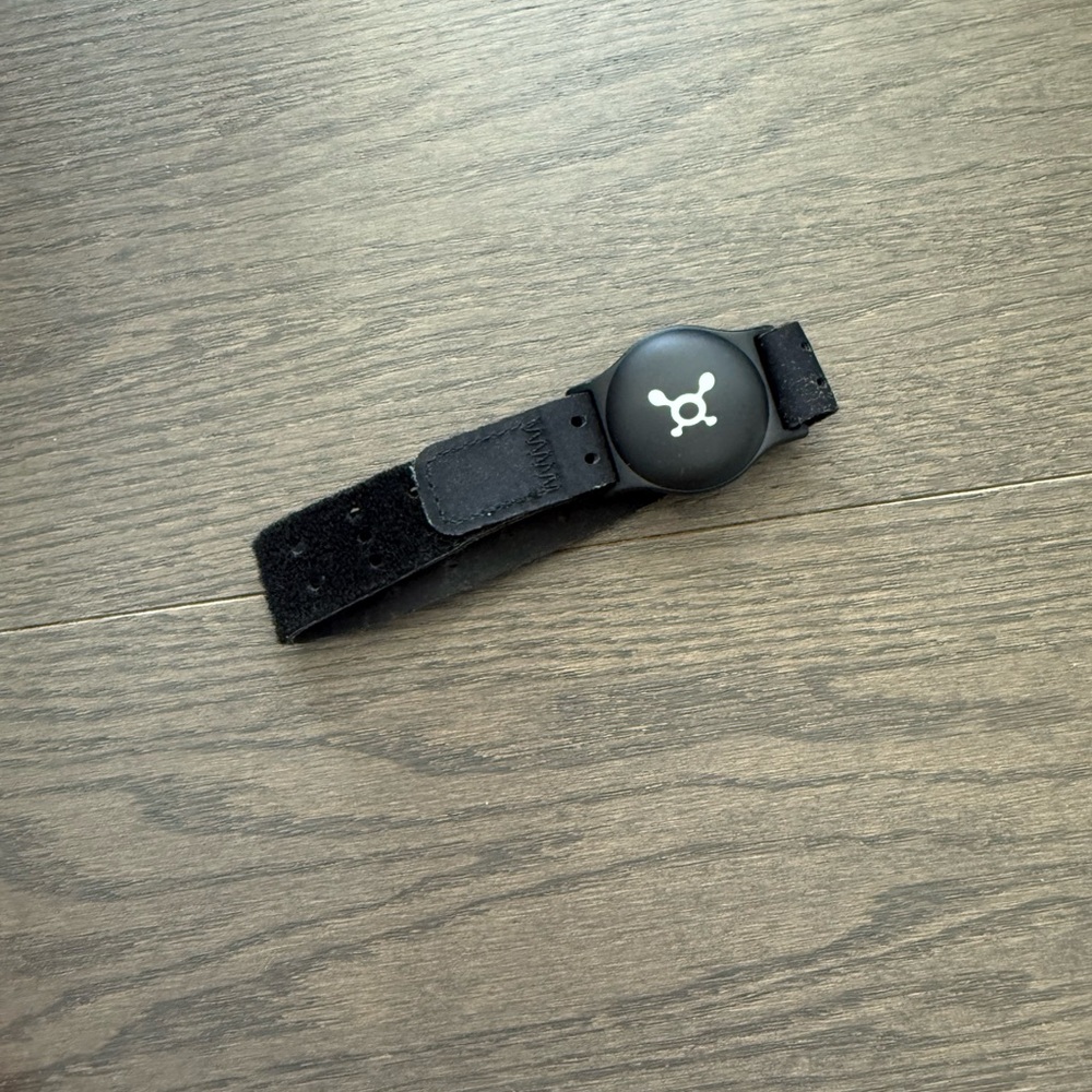 Black Fitness Tracker by Orangetheory
